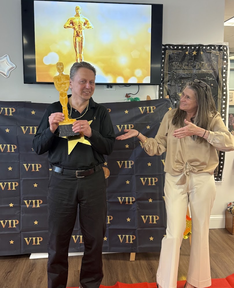 2 people at the Elder-Well Oscars winning an award
